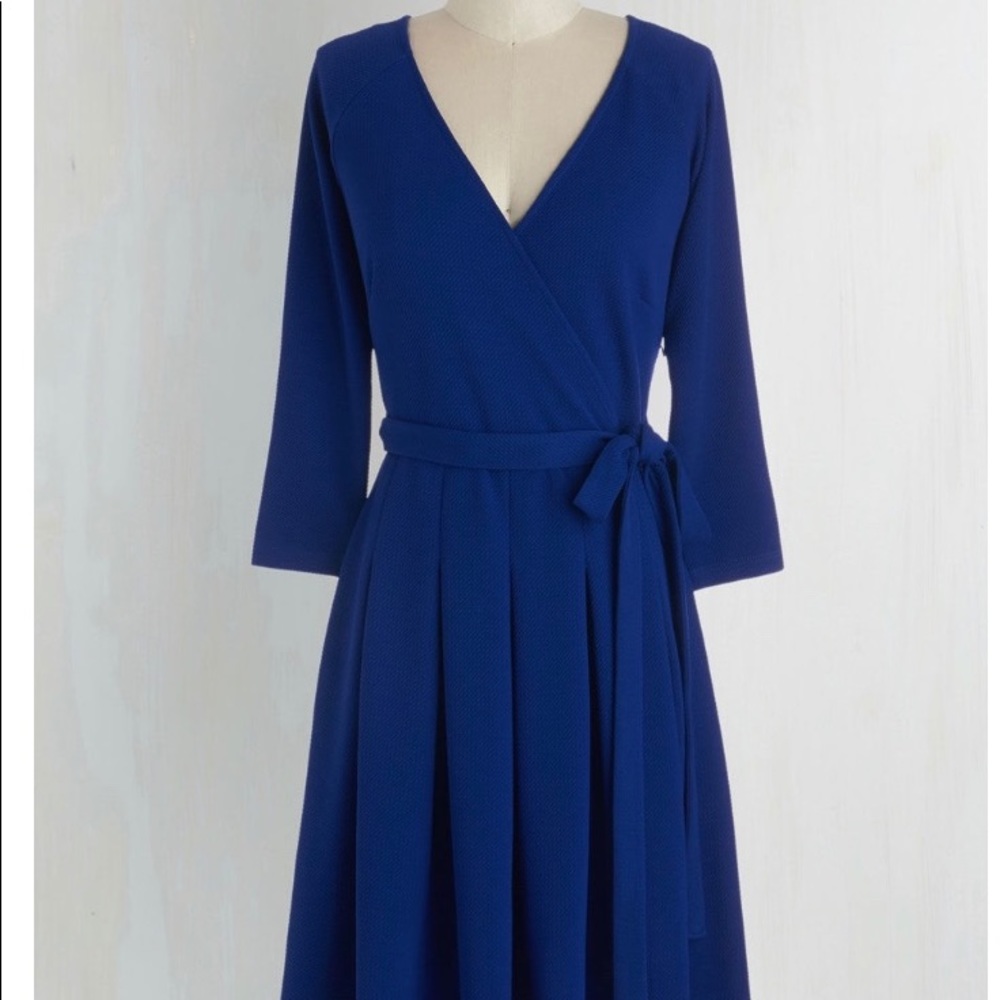 Skater style blue dress with waist tie